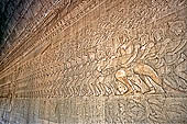 Angkor Wat temple, the bas-reliefs of the third enclosure. East Gallery Southern Part. Churning of the Ocean of Milk.